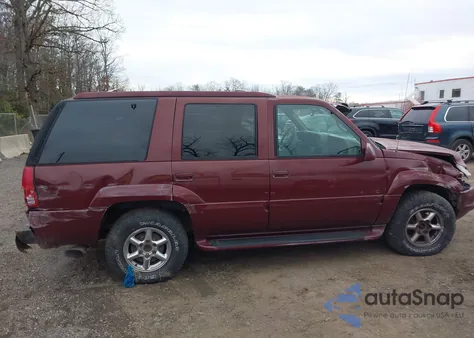 2000 Cadillac Escalade Standard z USA, uszkodzony, nr VIN 1GYEK13R1YR139930